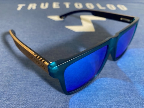 The Yhetee - Polarized sunglasses, Matte blue PC frame, Beech layered wood legs