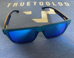 The Yhetee - Polarized sunglasses, Matte blue PC frame, Beech layered wood legs